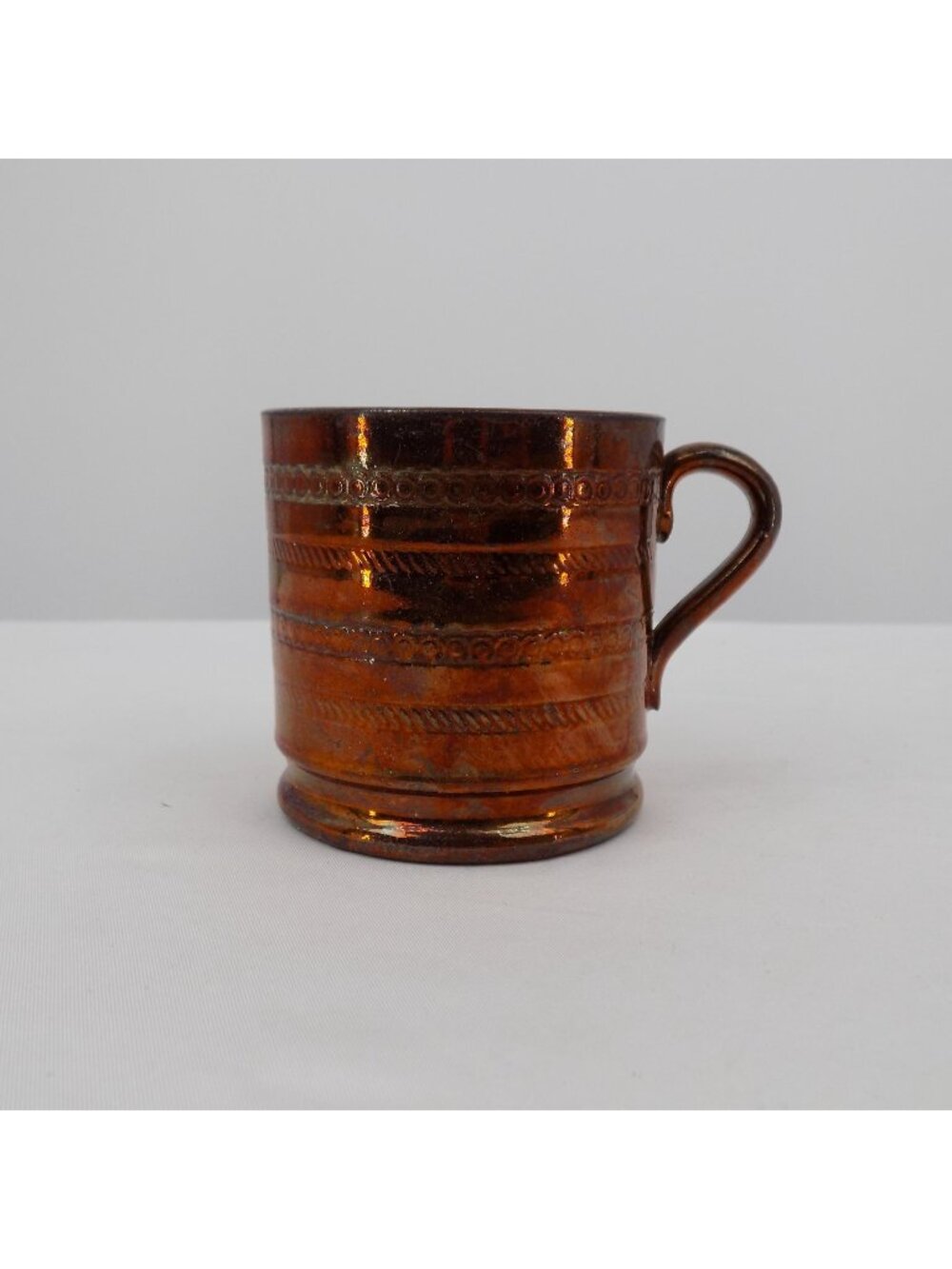 Antique Copper Lustreware Childs Mug Embossed Design 2 3/4" tall & diameter FLAW